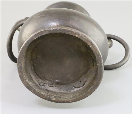 A Chinese bronze temple vase, Song-Yuan dynasty (12th-14th century), H. 29.5cm